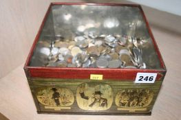 A tin of various coins