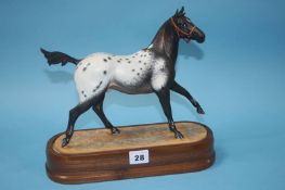 A Royal Worcester 'Appaloosa Stallion' modelled by Doris Lindner, no. 642/750, with certificate