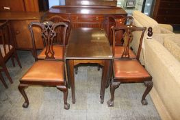 Sideboard, four chairs and a table