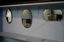 Three frameless mirrors