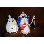 Three Royal Doulton and one Coalport figure