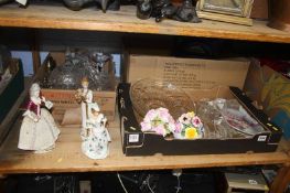 Three trays containing cut glass, figures and plates