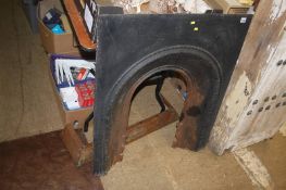 A metal fire surround and fender