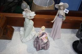 Two Nao figures and a Royal Worcester figure