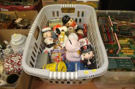 A box of novelty money boxes, Snoopy etc.