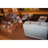 Four boxes of assorted and a sewing machine
