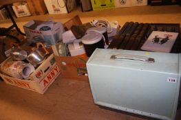 Four boxes of assorted and a sewing machine