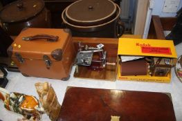 Mini sewing machine and a boxed Brownie camera