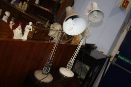 Two angle poise lamps