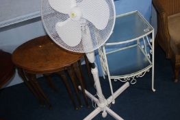 Walnut nest of tables, a fan and a metal two tier table