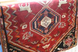 Wool rug, on red ground