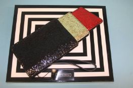 Black and Red 'Glitter Lipstick' pouch from Lulu Guinness, with box