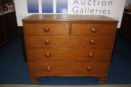 A 19th century oak straight front chest of drawers