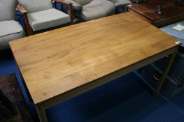 An Ercol rectangular dining table 122cm x 69cm x 71cm Height.