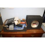 A box of audio equipment and accessories and "MTX Audio Thunder 5500" speaker