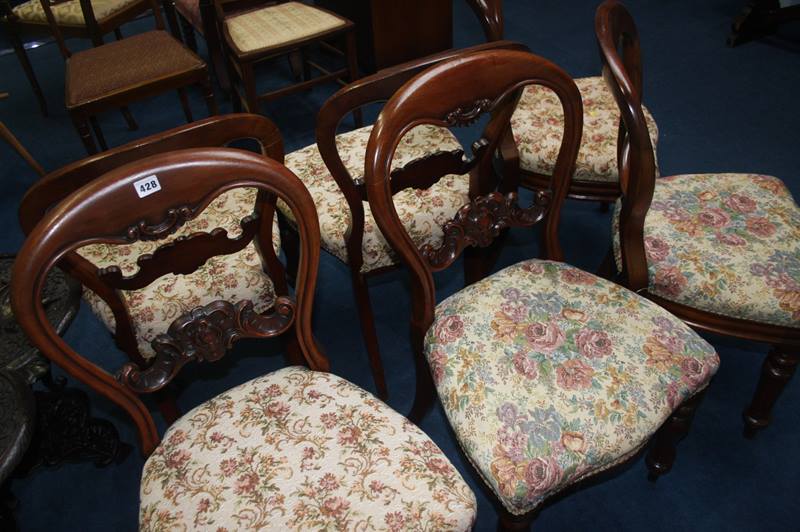 A set of four Victorian mahogany balloon back chairs and two others