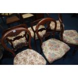 A set of four Victorian mahogany balloon back chairs and two others