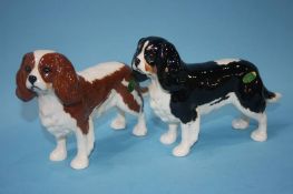 Two Beswick Spaniels