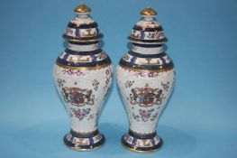 A pair of decorative vases and covers