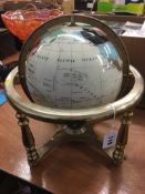 A gem stone globe