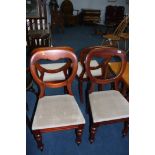 A set of four Victorian balloon back chairs