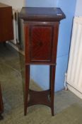 An Edwardian mahogany bedside cabinet