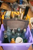 A box of miscellaneous to include glass bottles and tins