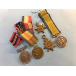 An unnamed World War II pair of medals and a World War I trio to 5170 D. Macniel AB RNR