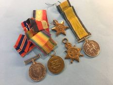 An unnamed World War II pair of medals and a World War I trio to 5170 D. Macniel AB RNR