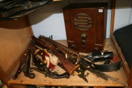 A wireless set to include replica pistols, khukri etc.