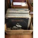 A box of vinyls including Elvis Presley