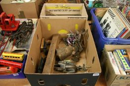Two boxes of assorted, brass, figures of knights etc.