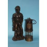 Coal mining figure and a miners lamp