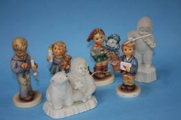 Four Hummel figures etc. (boxed)