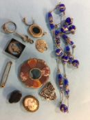 A silver mounted agate brooch, a cameo etc.