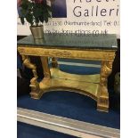 A marble top and gilt console table