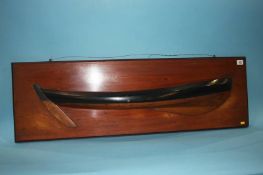 A 19th century half block model of a boat, 103cm length