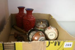 A box of Oriental items, enamelled jar, Buddha etc.