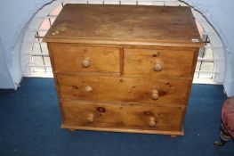 A small pine chest of drawers