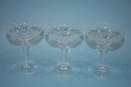 Nine champagne glasses