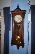 Walnut cased wall clock