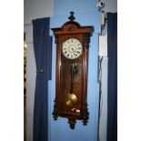 Walnut cased wall clock