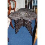 A Maple and Company carved trefoil occasional table