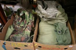 Two boxes of military surplus; British Army DPM jacket and webbing pouches etc.