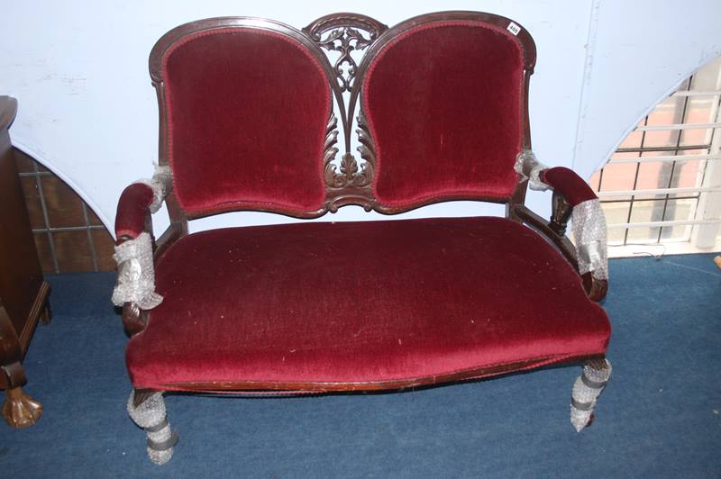 A small mahogany two seater settee