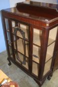 A mahogany china cabinet