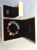 A Pandora charm bracelet etc.