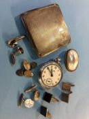 A silver cigarette case, cufflinks etc.