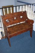 A leaf carved wooden bench