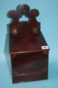 A 19th century mahogany salt box